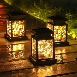 Lanterne Solaire Suspendue AIRA — métal ajouré, ambiance terrasse minimaliste