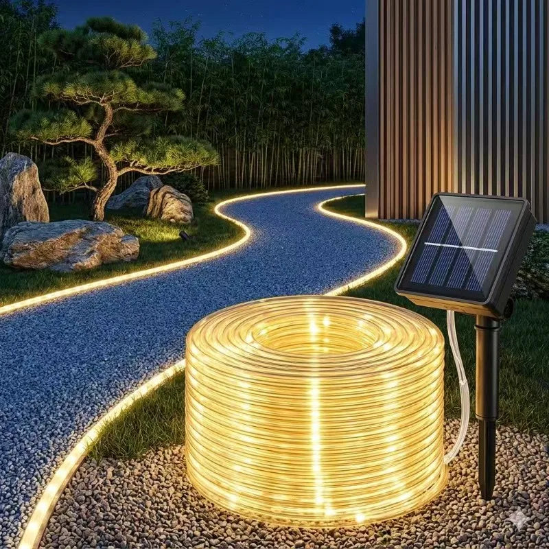 Guirlande Tube Solaire AIRA — lumière continue extérieure, ambiance terrasse minimaliste
