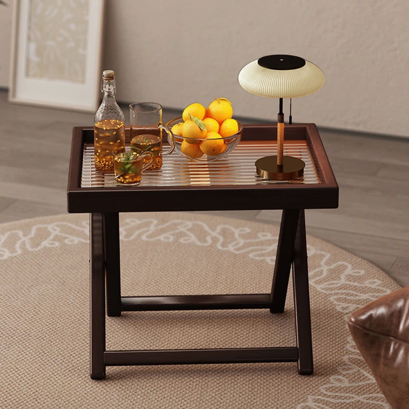Table Basse Pliante AIRA — bambou teinté ambre, ambiance terrasse minimaliste
